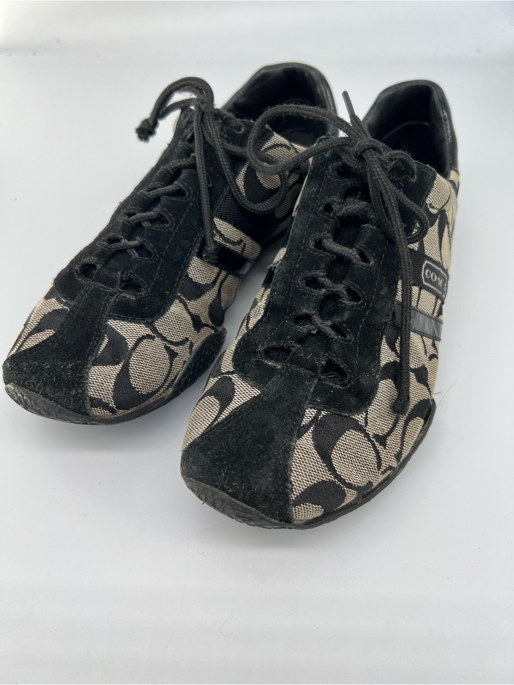 Coach Katelyn Black and Tan Signature Logo Lace-Up Sneakers
